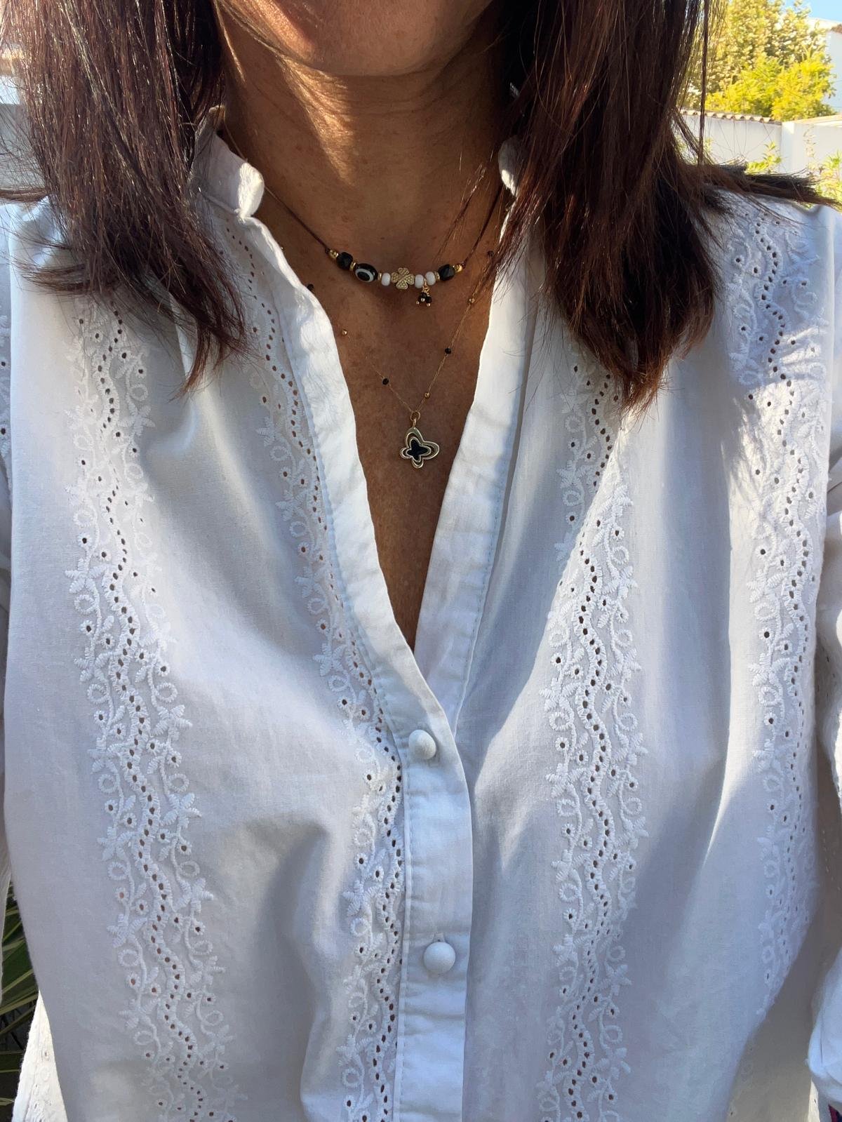 Collier papillon onyx et perles dorées