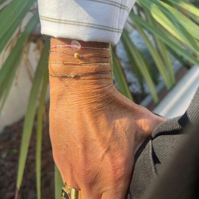 Bracelet Boule striée dorée