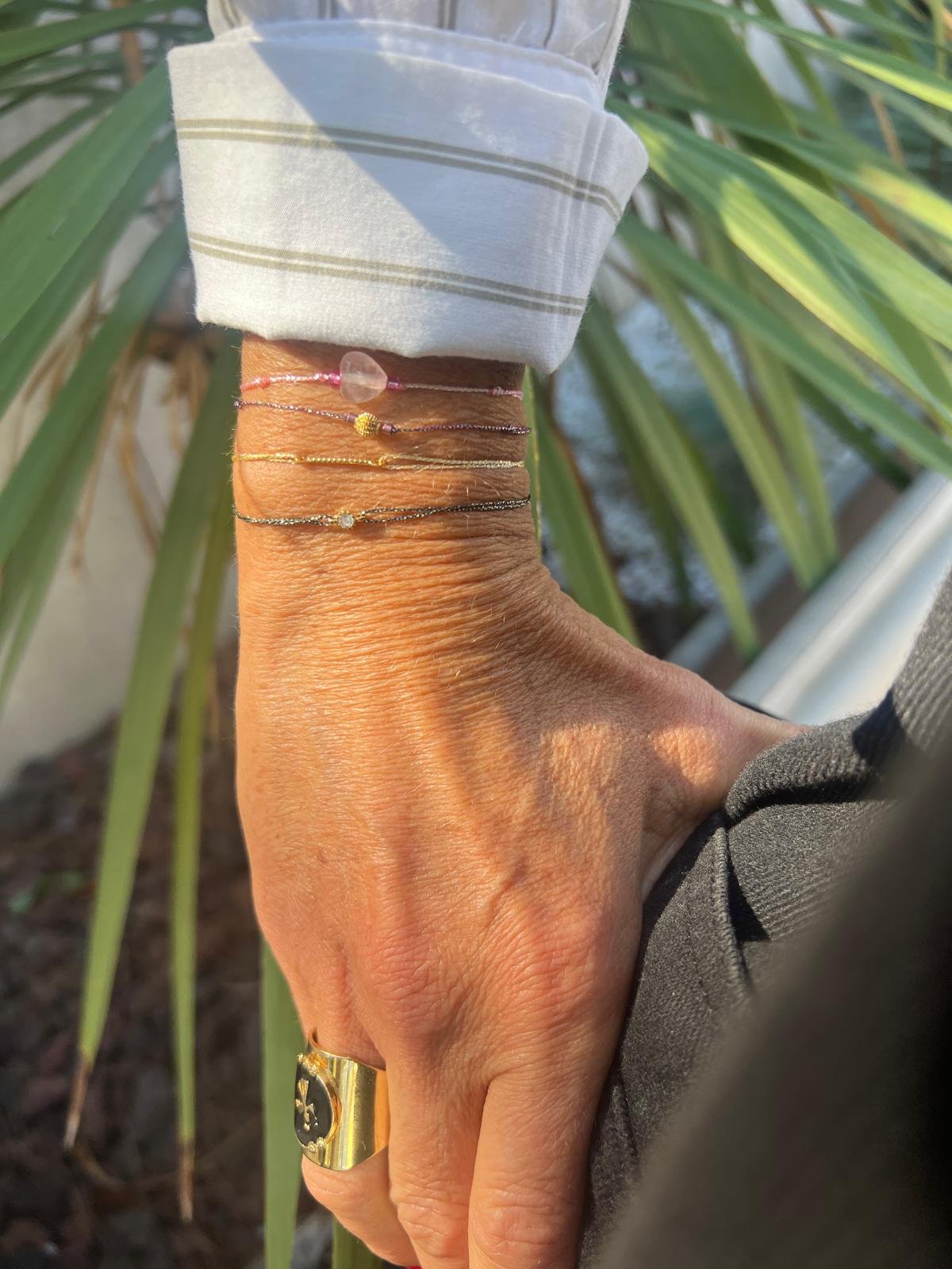 Bracelet Boule striée dorée